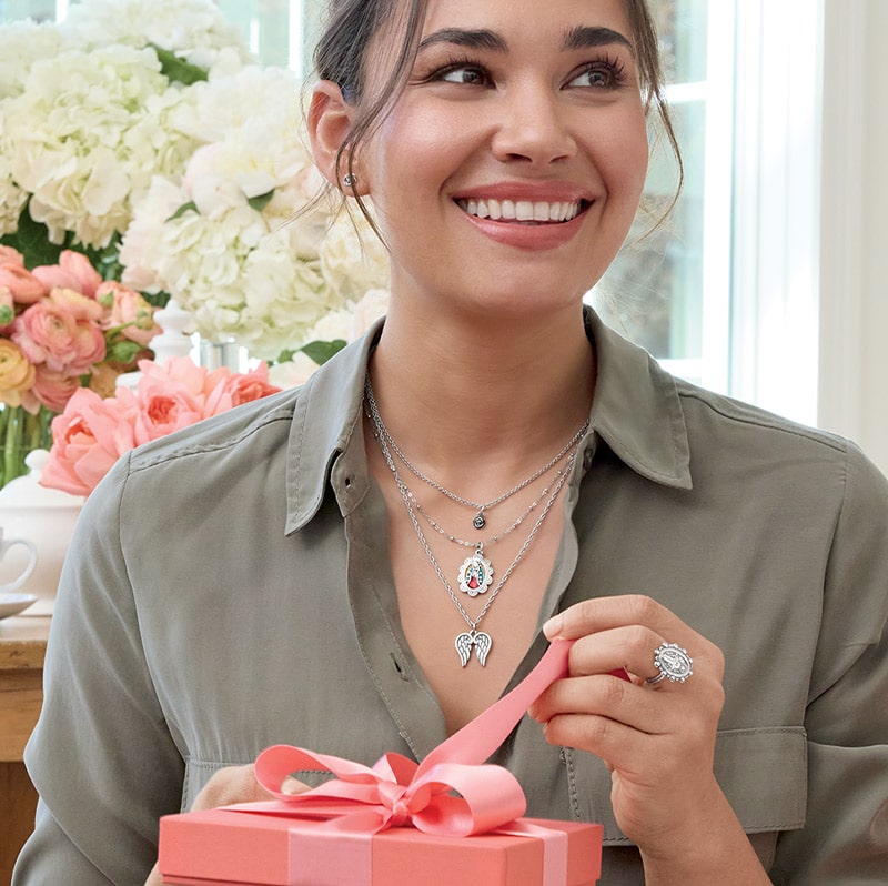Woman opening gift box